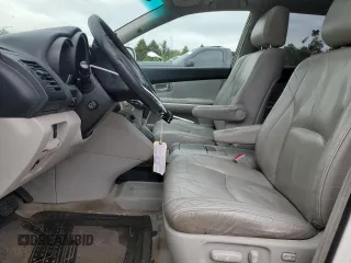 2006 Lexus RX 400h with VIN JTJHW31U760017663, listed as a Copart auction lot 58239885 with 195,120 mi miles and Salvage title. Bid and sale history available at DreamBid. Image 7.