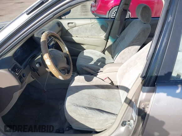 1998 Toyota Corolla VE z VIN 2T1BR18E9WC045442, wystawiony jako IAAI lot #42104201 z przebiegiem 243 256 mil mil oraz . Historia ofert i sprzedaży dostępna na DreamBid. Obrazek 5.