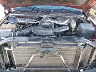 2003 Chevrolet Tahoe LS z VIN 1GNEK13Z73R127111, wystawiony jako IAAI lot #41830248 z przebiegiem Nie podano mil oraz . Historia ofert i sprzedaży dostępna na DreamBid. Obrazek 10.