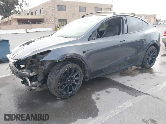 2021 Tesla Model Y Long Range with VIN 5YJYGAEE0MF223140, listed as a IAAI auction lot 42007701 with 55,308 mi miles. Bid and sale history available at carsss.com. Image 22.