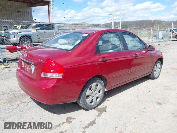 2009 Kia Spectra EX with VIN KNAFE221495665378, listed as a IAAI auction lot 42036945 with 153,254 mi miles. Bid and sale history available at carsss.com. Image 4.