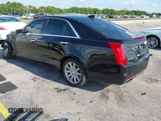 2015 Cadillac CTS RWD with VIN 1G6AP5SX8F0140364, listed as a IAAI auction lot 42535236 with 126,277 mi miles and . Bid and sale history available at DreamBid. Image 3.