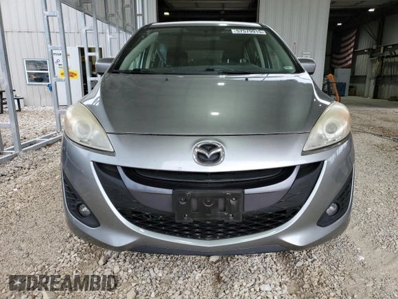 2012 Mazda 5 Touring z VIN JM1CW2CL6C0143536, wystawiony jako Copart lot #57579915 z przebiegiem 148 191 mil mil oraz Szkoda całkowita • Salvage title. Historia ofert i sprzedaży dostępna na DreamBid. Obrazek 5.