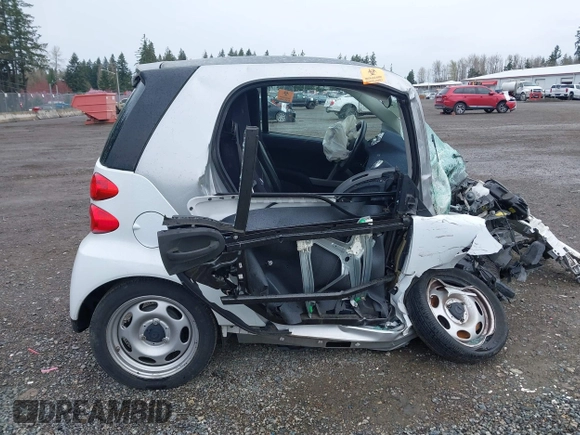 2012 Smart fortwo Pure z VIN WMEEJ3BA3CK573365, wystawiony jako IAAI lot #41910721 z przebiegiem Nie podano mil oraz . Historia ofert i sprzedaży dostępna na DreamBid. Obrazek 13.