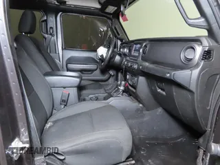 2023 Jeep Gladiator Freedom with VIN 1C6JJTAG9PL557861, listed as a Copart auction lot 56429485 with 44,716 mi miles and Salvage title. Bid and sale history available at DreamBid. Image 5.