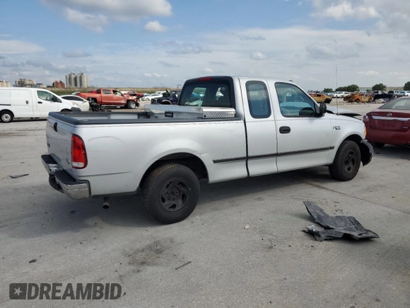 1999 Ford F-150 with VIN 1FTZX1729XNB67194, listed as a Copart auction lot 58383345 with Not provided miles and Salvage title. Bid and sale history available at DreamBid. Image 3.