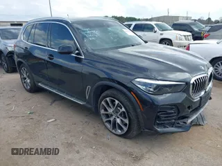 2023 BMW X5 xDrive40i with VIN 5UXCR6C00P9R56116, listed as a IAAI auction lot 41504795 with 39,425 mi miles. Bid and sale history available at carsss.com. Image 1.