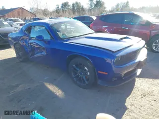 2022 Dodge Challenger GT with VIN 2C3CDZKG2NH258415, listed as a IAAI auction lot 41257317 with 23,398 mi miles. Bid and sale history available at carsss.com. Image 1.