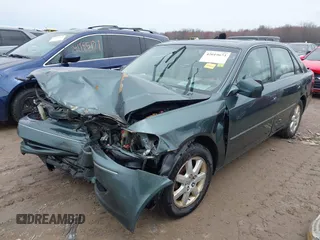 2003 Toyota Avalon XL with VIN 4T1BF28B73U272434, listed as a IAAI auction lot 42019673 with 231,796 mi miles and . Bid and sale history available at carsss.com. Image 19.