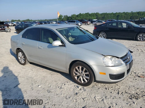 2010 Volkswagen Jetta SE with VIN 3VWRX7AJ1AM048637, listed as a Copart auction lot 57045965 with 158,297 mi miles and Salvage title. Bid and sale history available at DreamBid. Image 4.