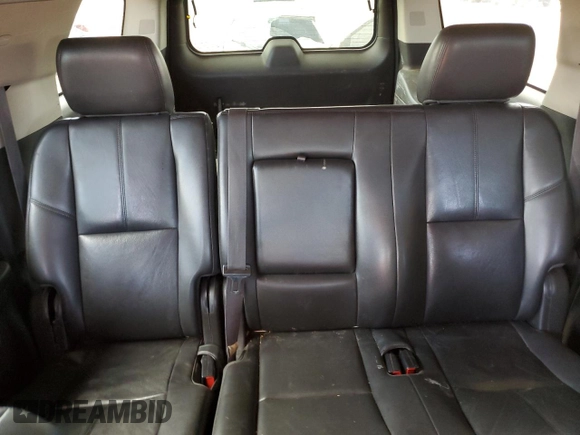 2013 GMC Yukon XL SLT with VIN 1GKS1KE09DR305240, listed as a Copart auction lot 53143565 with 210,872 mi miles and Salvage Title. Bid and sale history available at DreamBid. Image 10.