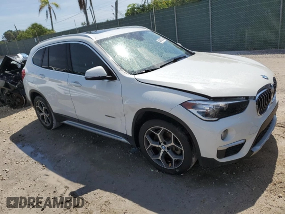 2018 BMW X1 sDrive28i with VIN WBXHU7C38J5H44459, listed as a Copart auction lot 49107553 with 96,494 mi miles and . Bid and sale history available at DreamBid. Image 4.