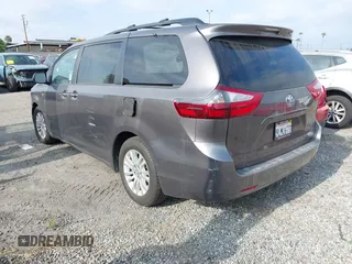 2015 Toyota Sienna XLE with VIN 5TDYK3DC6FS660410, listed as a IAAI auction lot 41801496 with 81,755 mi miles. Bid and sale history available at carsss.com. Image 3.