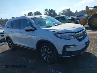 2020 Honda Pilot Elite with VIN 5FNYF6H09LB039247, listed as a IAAI auction lot 41364383 with 56,865 mi miles and . Bid and sale history available at DreamBid. Image 12.
