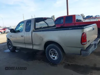2000 Ford F-150 XL with VIN 1FTZX1723YKB48613, listed as a IAAI auction lot 41611851 with 187,450 mi miles. Bid and sale history available at carsss.com. Image 14.