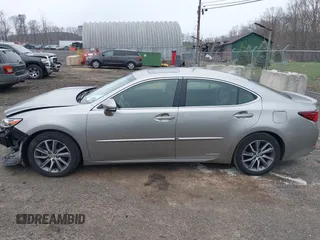 2017 Lexus ES 300h with VIN JTHBW1GG2H2147869, listed as a IAAI auction lot 41999737 with 88,008 mi miles and . Bid and sale history available at DreamBid. Image 14.