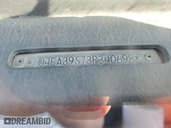2003 Jeep Wrangler X with VIN 1J4FA39S73P340698, listed as a Copart auction lot 73888624 with 49,677 mi miles and Salvage Title. Bid and sale history available at carsss.com. Image 14.