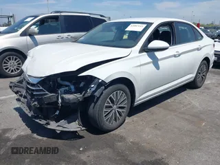 2021 Volkswagen Jetta S z VIN 3VWC57BU4MM037088, wystawiony jako IAAI lot #42087111 z przebiegiem 82 728 mil mil oraz . Historia ofert i sprzedaży dostępna na DreamBid. Obrazek 2.