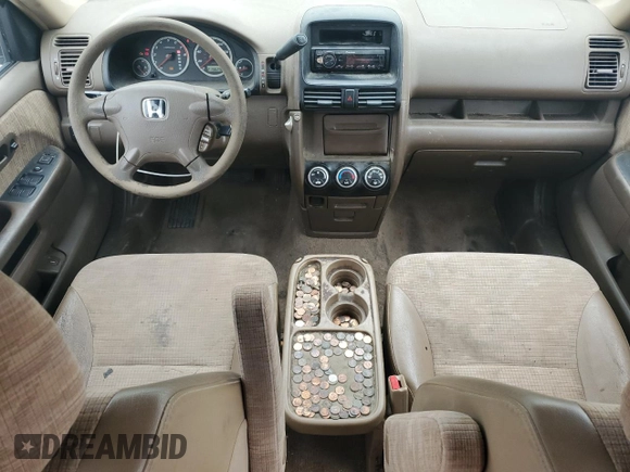 2003 Honda CR-V LX z VIN JHLRD78413C004656, wystawiony jako Copart lot #53993725 z przebiegiem 219 629 mil mil oraz Czysty tytuł • Clean title. Historia ofert i sprzedaży dostępna na DreamBid. Obrazek 8.