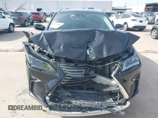 2016 Lexus RX 350 z VIN 2T2BZMCA4GC047800, wystawiony jako IAAI lot #42270406 z przebiegiem 112 181 mil mil oraz . Historia ofert i sprzedaży dostępna na DreamBid. Obrazek 12.