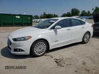2015 Ford Fusion SE Hybrid z VIN 3FA6P0LU8FR257491, wystawiony jako Copart lot #60564485 z przebiegiem 200 020 mil mil oraz Czysty tytuł • Clean title. Historia ofert i sprzedaży dostępna na DreamBid. Obrazek 1.