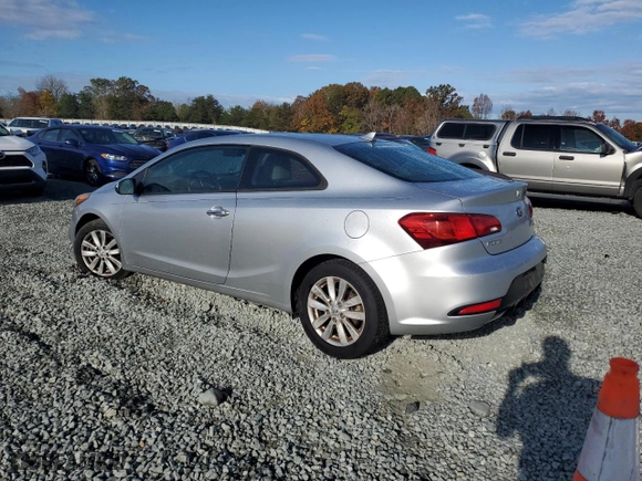 2014 Kia Forte Koup EX with VIN KNAFX6A80E5250701, listed as a Copart auction lot 79442734 with 144464 miles and Salvage Title. Bid and sale history available at carsss.com. Image 2.
