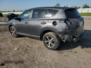 2018 Toyota RAV4 XLE with VIN 2T3WFREV0JW517488, listed as a Copart auction lot 51000975 with 68,105 mi miles and Salvage title. Bid and sale history available at DreamBid. Image 2.
