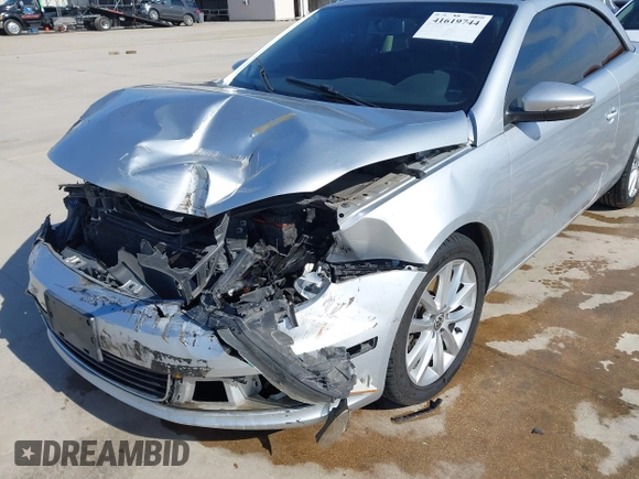 2012 Volkswagen Eos Komfort with VIN WVWBW7AH5CV005738, listed as a IAAI auction lot 41619744 with 131,340 mi miles and . Bid and sale history available at DreamBid. Image 6.