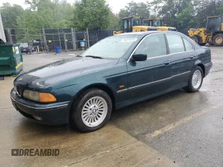 1997 BMW 5 Series 540i z VIN WBADE632XVBW55505, wystawiony jako Copart lot #56876645 z przebiegiem Nie podano mil oraz Czysty tytuł • Clean title. Historia ofert i sprzedaży dostępna na DreamBid. Obrazek 1.