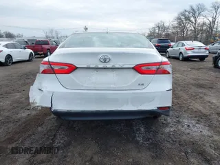 2020 Toyota Camry LE with VIN 4T1C11AK9LU912585, listed as a IAAI auction lot 41711816 with 142,751 mi miles. Bid and sale history available at carsss.com. Image 16.