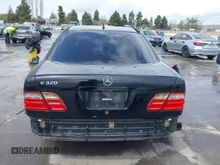 2000 Mercedes-Benz E-Class with VIN WDBJF65JXYA997410, listed as a IAAI auction lot 41939485 with 158,559 mi miles. Bid and sale history available at carsss.com. Image 17.