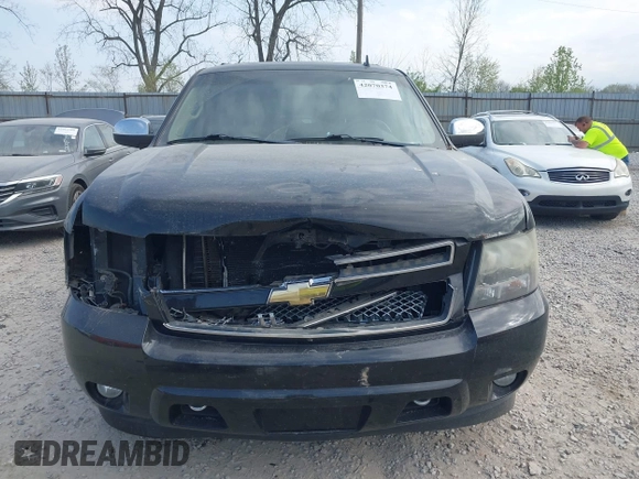 2011 Chevrolet Suburban LTZ with VIN 1GNSKKE39BR303754, listed as a IAAI auction lot 42070374 with 207,824 mi miles and . Bid and sale history available at DreamBid. Image 12.
