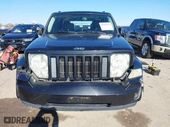 2012 Jeep Liberty Sport z VIN 1C4PJLAK6CW188649, wystawiony jako IAAI lot #41042923 z przebiegiem 174 598 mil mil oraz . Historia ofert i sprzedaży dostępna na DreamBid. Obrazek 12.