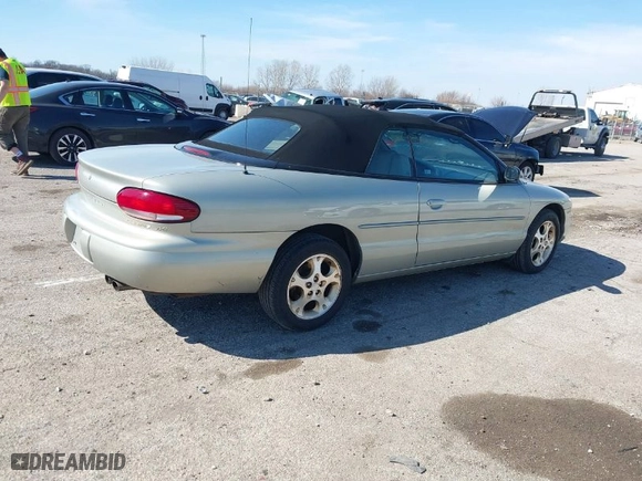 1999 Chrysler Sebring Jxi with VIN 3C3EL55H6XT603058, listed as a IAAI auction lot 41774322 with 157,852 mi miles. Bid and sale history available at carsss.com. Image 4.