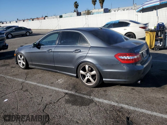 2011 Mercedes-Benz E 550 Luxury with VIN WDDHF7CBXBA307881, listed as a Copart auction lot 84961394 with 192,563 mi miles and Salvage Title. Bid and sale history available at DreamBid. Image 2.
