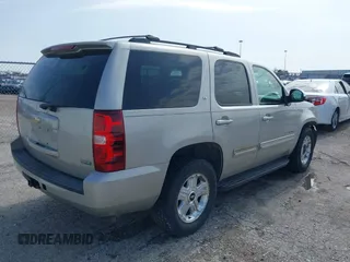 2009 Chevrolet Tahoe 2LT z VIN 1GNEC23379R258434, wystawiony jako IAAI lot #41558672 z przebiegiem 133 646 mil mil oraz . Historia ofert i sprzedaży dostępna na DreamBid. Obrazek 4.