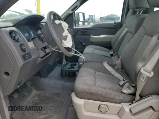 2010 Ford F-150 XL with VIN 1FTMF1CW2AKE74396, listed as a Copart auction lot 55518535 with 200,140 mi miles and Salvage title. Bid and sale history available at DreamBid. Image 7.