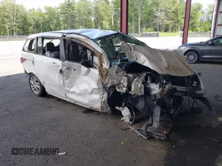 2012 Mazda 5 Sport with VIN JM1CW2BL9C0115277, listed as a IAAI auction lot 42618557 with 131,798 mi miles and . Bid and sale history available at DreamBid. Image 1.