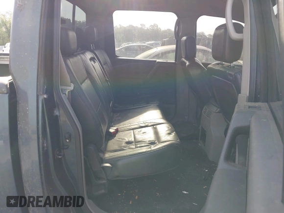 2004 Nissan Titan LE with VIN 1N6AA07A84N549757, listed as a IAAI auction lot 42083786 with 313,053 mi miles and . Bid and sale history available at DreamBid. Image 8.