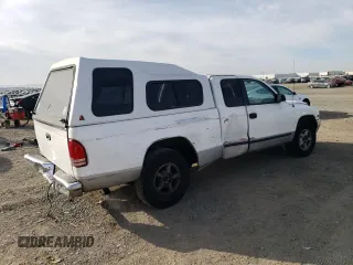 1997 Dodge Dakota z VIN 1B7GL23X0VS124517, wystawiony jako Copart lot #82896894 z przebiegiem 227 782 mil mil oraz Szkoda całkowita • Salvage title. Historia ofert i sprzedaży dostępna na DreamBid. Obrazek 3.