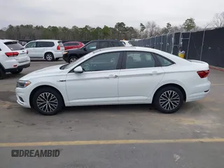 2019 Volkswagen Jetta SEL z VIN 3VWE57BU4KM248989, wystawiony jako IAAI lot #41465186 z przebiegiem 41 985 mil mil oraz . Historia ofert i sprzedaży dostępna na DreamBid. Obrazek 14.
