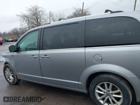 2019 Dodge Grand Caravan SXT with VIN 2C4RDGCG1KR580039, listed as a IAAI auction lot 41997472 with 163,915 mi miles and . Bid and sale history available at DreamBid. Image 15.