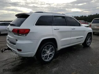 2021 Jeep Grand Cherokee Overland with VIN 1C4RJFCG1MC671472, listed as a Copart auction lot 86326714 with 103,760 mi miles and Salvage Title. Bid and sale history available at carsss.com. Image 3.