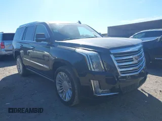 2016 Cadillac Escalade Platinum z VIN 1GYS4DKJ3GR217116, wystawiony jako IAAI lot #41679348 z przebiegiem 122 811 mil mil oraz . Historia ofert i sprzedaży dostępna na DreamBid. Obrazek 1.