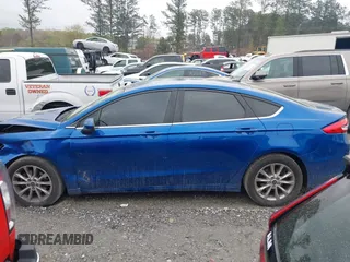 2017 Ford Fusion SE z VIN 3FA6P0H77HR309263, wystawiony jako IAAI lot #41914769 z przebiegiem 136 833 mil mil oraz . Historia ofert i sprzedaży dostępna na DreamBid. Obrazek 13.