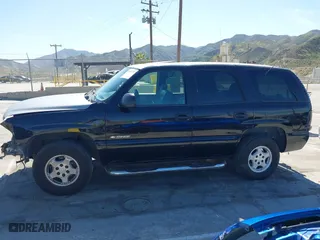 2001 Chevrolet Tahoe LT with VIN 1GNEC13T31R122882, listed as a IAAI auction lot 41999271 with 211,687 mi miles. Bid and sale history available at carsss.com. Image 15.
