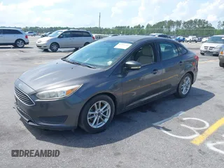 2016 Ford Focus SE with VIN 1FADP3F26GL207417, listed as a IAAI auction lot 42107442 with 116,700 mi miles. Bid and sale history available at carsss.com. Image 2.
