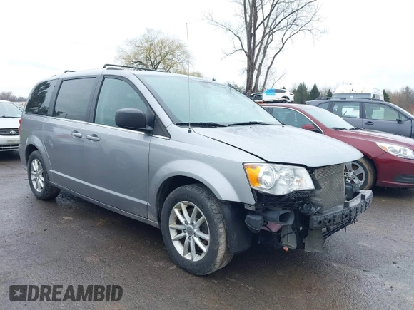 2019 Dodge Grand Caravan SXT with VIN 2C4RDGCG1KR580039, listed as a IAAI auction lot 41997472 with 163,915 mi miles and . Bid and sale history available at DreamBid. Image 1.