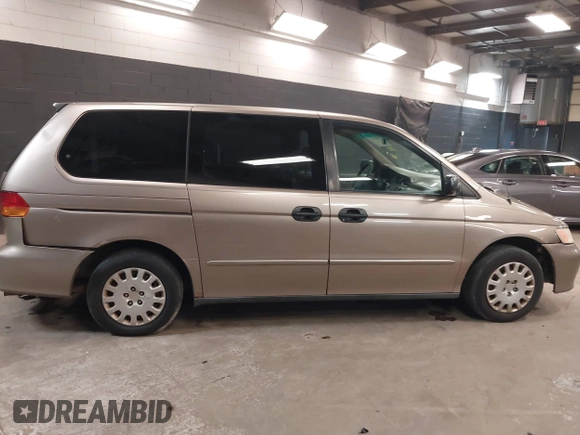 2004 Honda Odyssey LX with VIN 5FNRL18534B072936, listed as a IAAI auction lot 42366971 with 185,534 mi miles and . Bid and sale history available at DreamBid. Image 13.