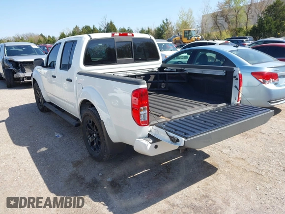 2021 Nissan Frontier SV z VIN 1N6ED0EA4MN704865, wystawiony jako IAAI lot #41990731 z przebiegiem 13 329 mil mil oraz . Historia ofert i sprzedaży dostępna na DreamBid. Obrazek 3.